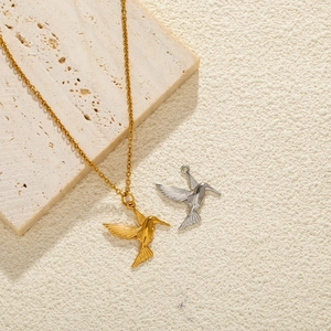 Vintage stainless steel hummingbird pendant necklaces in gold and silver finishes