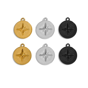Polished stainless steel eight-pointed star compass pendants in gold, silver, and black finishes