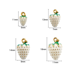 Detailed size comparison of 3D strawberry charms in white enamel and stainless steel