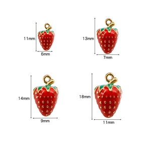 Size comparison of four red strawberry charms in various dimensions for DIY projects