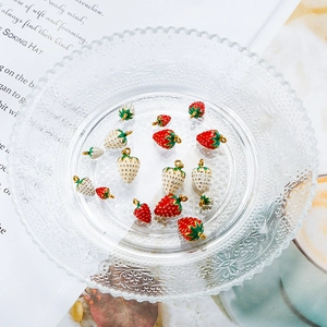3D stainless steel strawberry pendants in red and cream enamel for DIY jewelry making