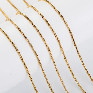 Detailed close-up of 1.8mm golden stainless steel box chain necklace segments