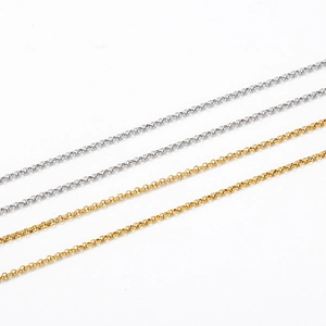Detail of 2mm pearl delicate link chains in vacuum plated gold and silver steel