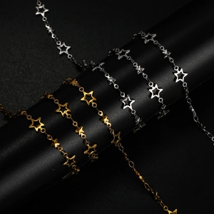 Detailed view of hollow and solid star chain bracelets in gold and silver finish