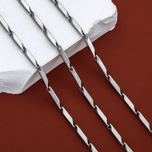 Detailed view of silver stainless steel stick chain with polished industrial tube links