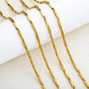 Polished gold vacuum-plated stainless steel stick chain with textured cylindrical links