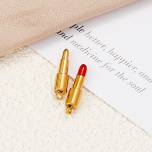 Detail view of lipstick shaped titanium steel pendants in gold and red finish