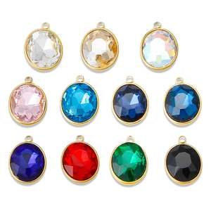 Set of 11 multi-colored faceted crystal pendants with 18K gold plated metal frames