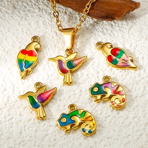 Handmade enamel bird and chameleon charms on a delicate gold-plated stainless steel chain