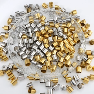 Close-up of gold and silver stainless steel cord ends for DIY jewelry making