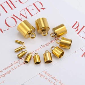 Macro view of gold-plated stainless steel cord end caps for DIY jewelry and bracelet making