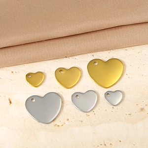 Polished stainless steel heart pendants in gold and silver for DIY jewelry making
