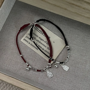 S925 sterling silver woven bracelet set with peace charms in red and black colors