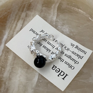 Irregular S925 silver ring with lava texture and black onyx bead in minimalist design