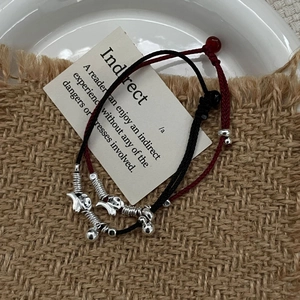 Handcrafted 925 silver puppy charm bracelets with red and black braided ropes