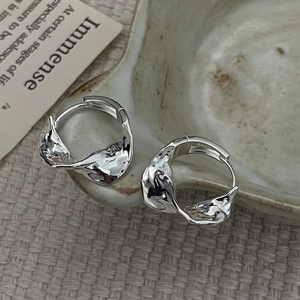 Minimalist S925 sterling silver hoop earrings with irregular lava texture design