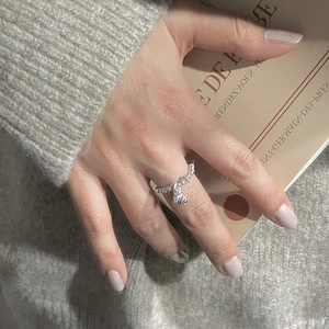 Close-up of S925 sterling silver beaded ring featuring a cute 3D bear animal charm