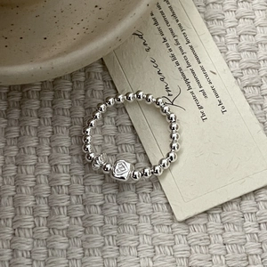 Minimalist S925 sterling silver beaded stretch ring with a heart-shaped square pendant