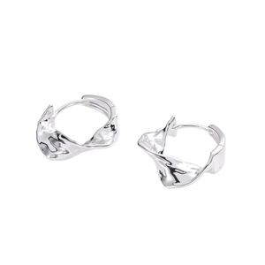 Minimalist S925 sterling silver hoop earrings with irregular lava texture and wrinkled design