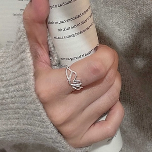 Minimalist S925 sterling silver hollow heart ring with multilayered interlaced design