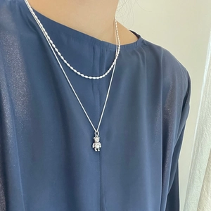 Minimalist double-layered S925 sterling silver rice bead necklace with a bear pendant