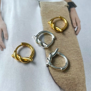 Boucles d'oreilles créoles nouées en argent S925 finitions dorée et argentée