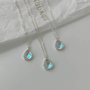 Minimalist 925 sterling silver waterdrop necklace featuring iridescent gemstone pendant