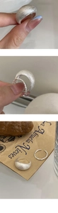 Detailed close-up of S925 sterling silver matte brushed ring with hallmark engraving