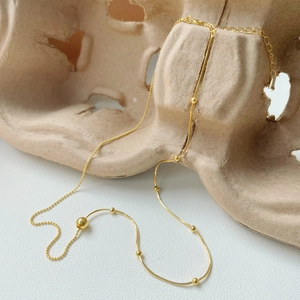Elegant gold-plated 925 silver snake chain necklace with spherical bead accents for women