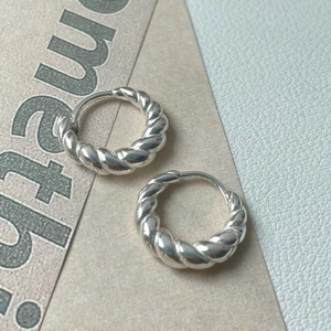 Minimalist 925 sterling silver twisted hoop earrings with a polished spiral design