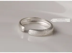 Close-up of S925 sterling silver ring with brushed matte finish and inner hallmark