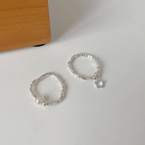 925 sterling silver beaded ring set with white round pearl and hollow flower charm