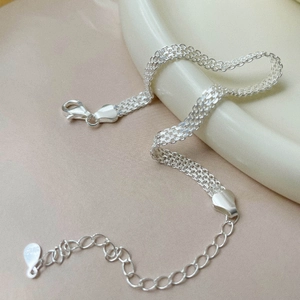 Bracelet en maille tissée argent massif S925 avec breloque cœur et fermoir homard
