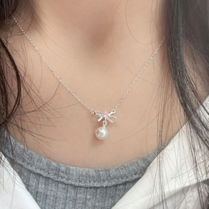 S925 sterling silver necklace with bow pendant, pink stone and white pearl detail