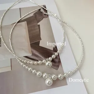 Elegant French style sterling silver necklace with round pearls and sparkling rhinestone details