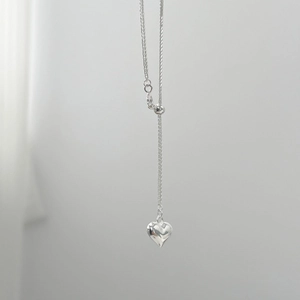 Detailed view of 925 sterling silver long heart necklace with adjustable slider bead chain
