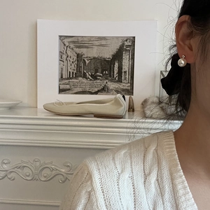 Minimalist pearl earrings for women with French retro aesthetic and ballet flats lifestyle