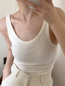 Minimalist 925 sterling silver heart long chain necklace shown on a female model