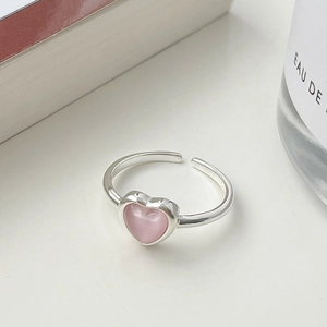 Minimalist S925 silver adjustable open ring with a pink heart-shaped cat-eye stone