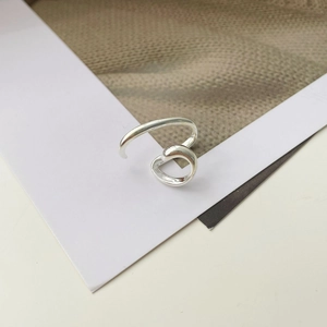 Detailed macro view of S925 sterling silver irregular double-layer ear bone cuff