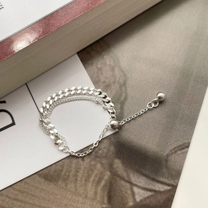 Detail of S925 sterling silver double layer chain ring with adjustable slide clasp closure