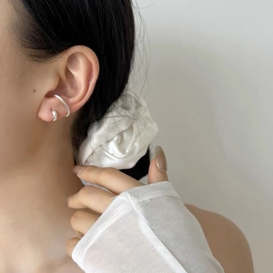 Minimalist S925 sterling silver double layer ear cuff and earring on a model