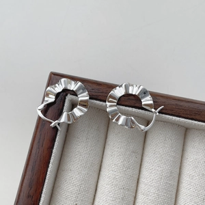Minimalist S925 sterling silver hoop earrings featuring artistic pleated wavy textures