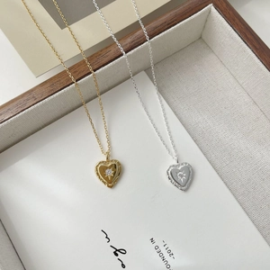 Elegant gold and silver S925 heart pendant necklace with star-set zircon in jewelry box