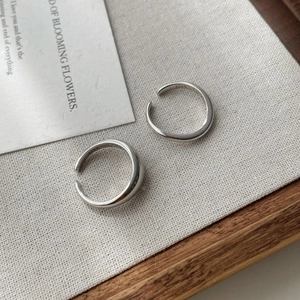 Macro detail of S925 sterling silver stamp on the inner band of a minimalist ring