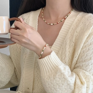 Detail shot of S925 silver beaded necklace and bracelet set with freshwater pearls