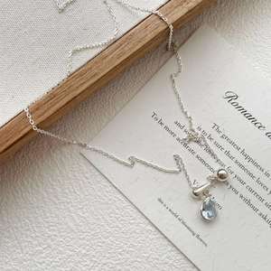 Detail of S925 sterling silver necklace with blue water drop zircon and adjustable chain