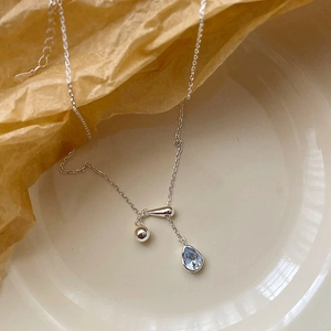 Elegant S925 sterling silver necklace with a blue teardrop zircon and adjustable bead chain