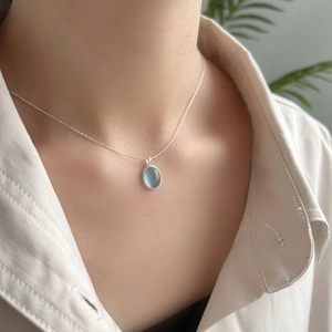 Minimalist S925 silver necklace with oval aquamarine stone pendant on a delicate chain