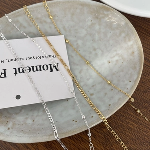 Three-piece set of S925 sterling silver Figaro and bead bracelets in gold and silver